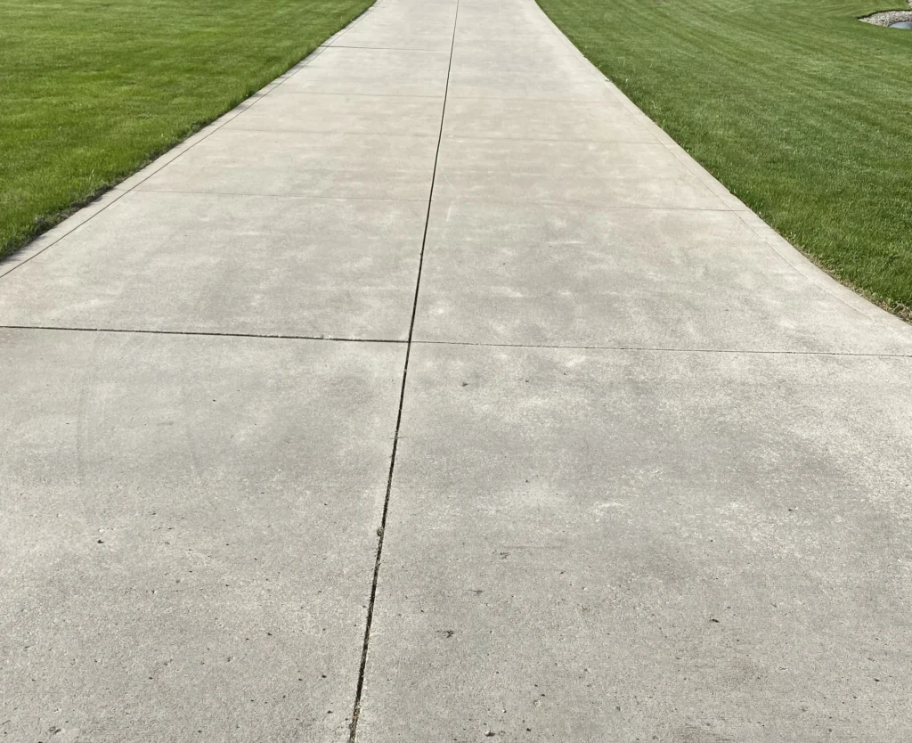 Driveway after pressure washing - Wakarusa, IN